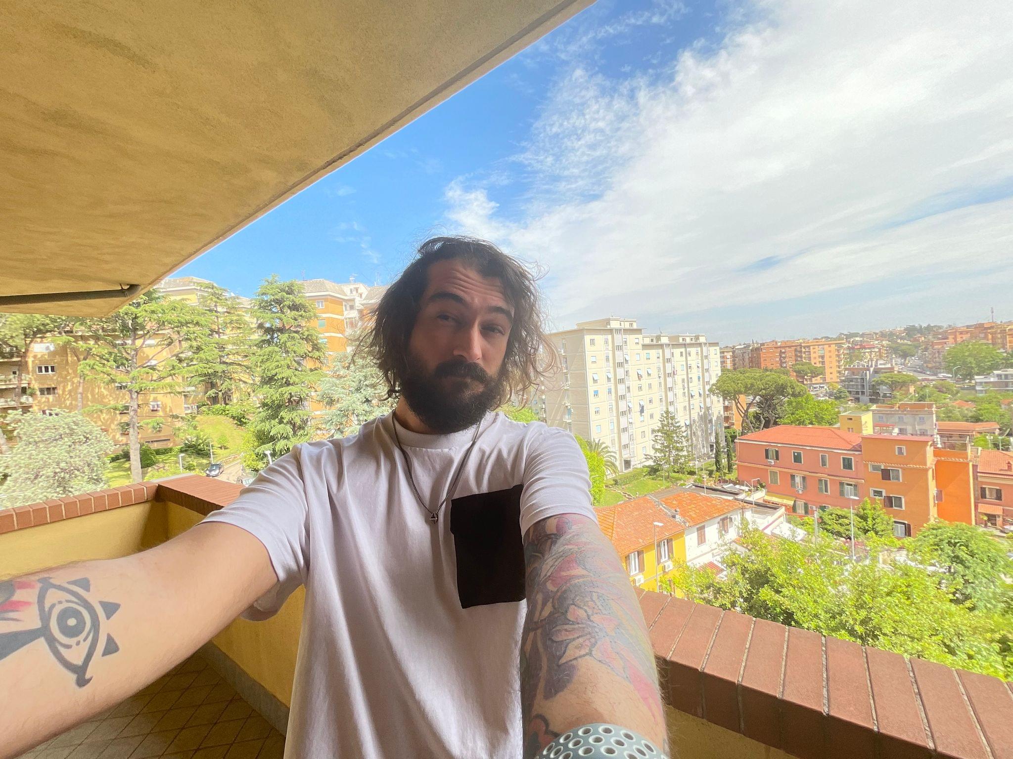 An ultra-wide selfie taken on iPad Pro.