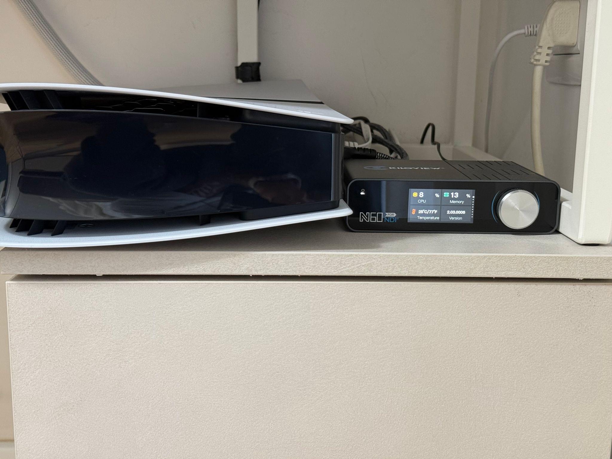 My PS5 Pro and N60 encoder next to it.