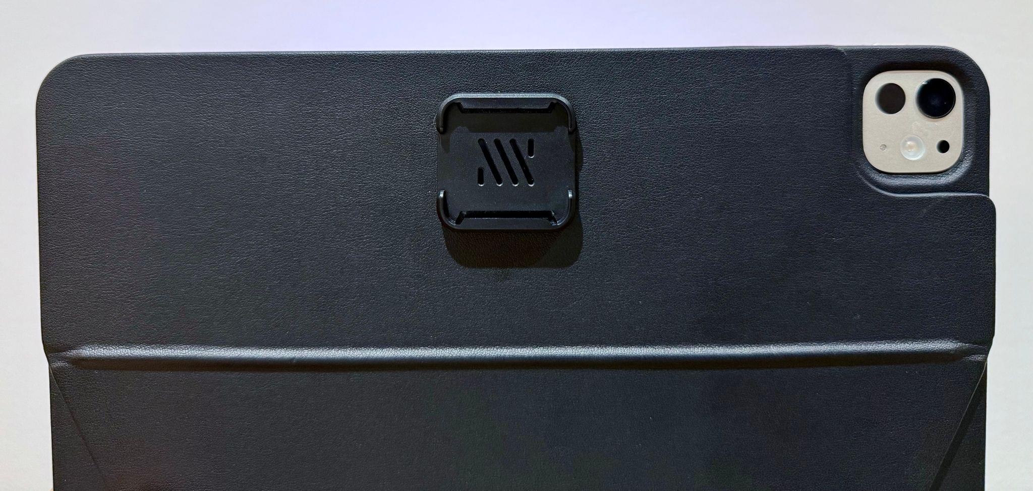 The mounting clip attached to the back cover.