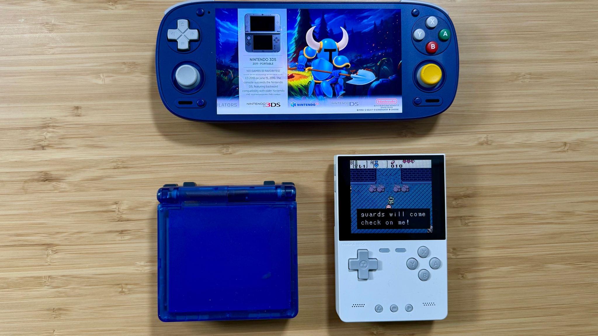 Retroid Pocket 5 (top), Anbernic RG35XXSP (bottom left), TrimUI Brick (bottom right).