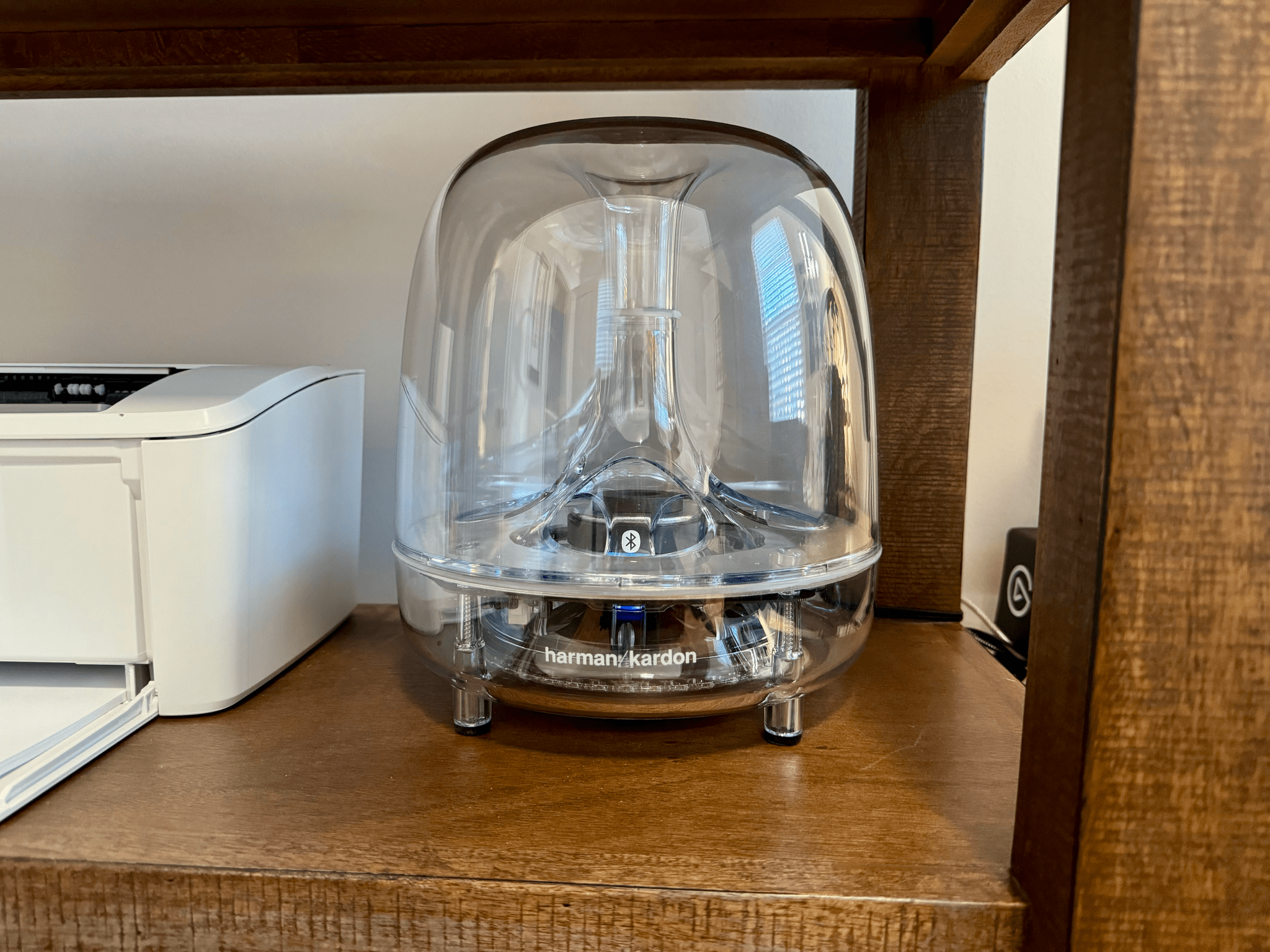 The Harmon Kardon SoundSticks III subwoofer.