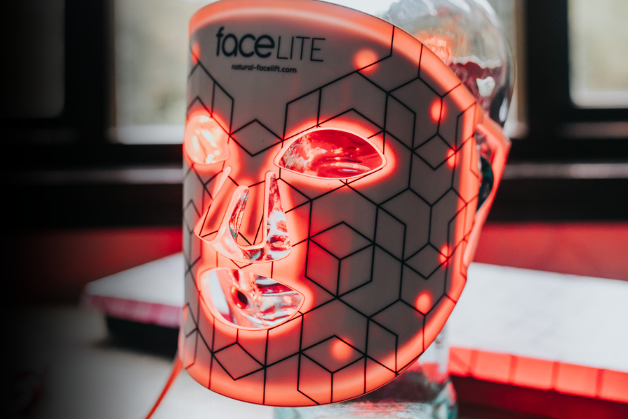 faceLITE LED therapy mask glowing red light